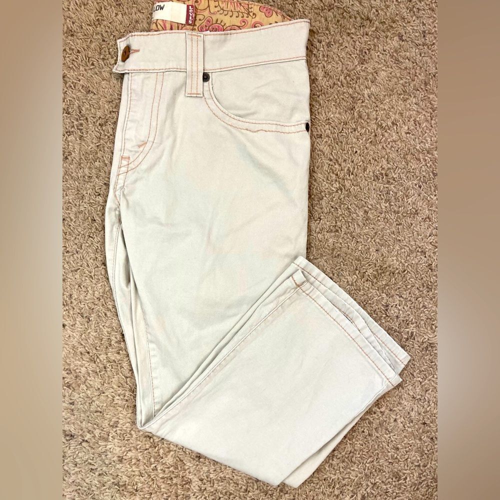 Levi's 542 mid rise light tan hipster Jeans w/ cool flap back pockets
